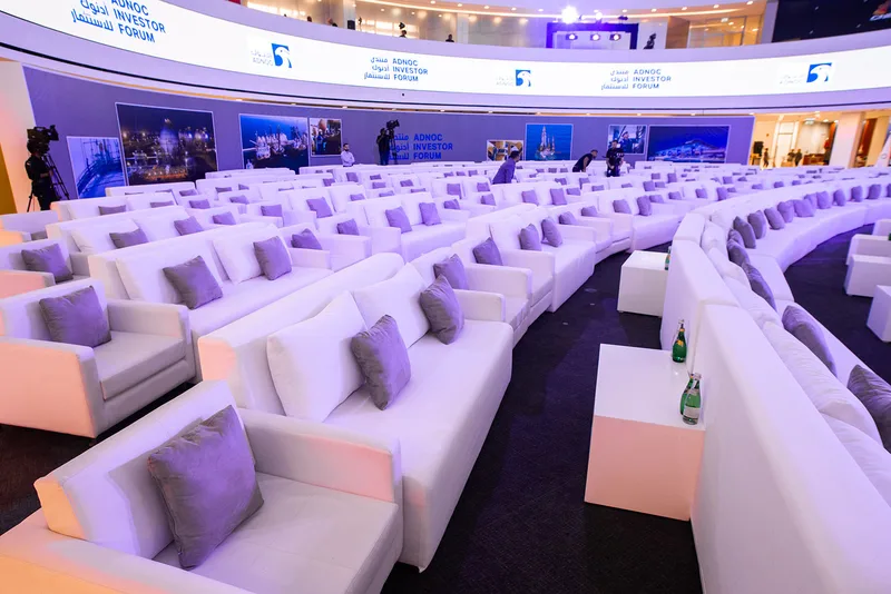 Contemporary white hospitality furniture creating a premium executive lounge environment.