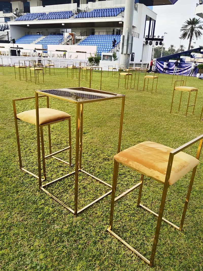 Elegant hospitality furniture layout featuring Audrey seating and Enzo tables in VIP areas.