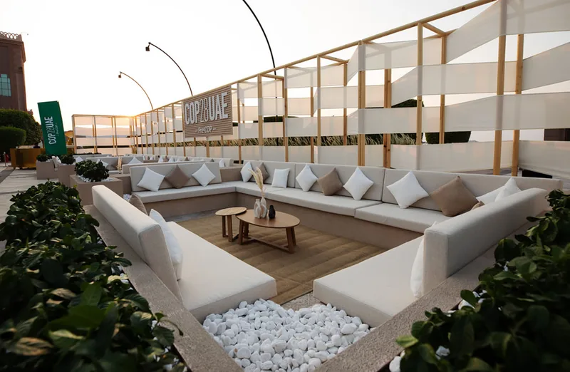 Contemporary hospitality seating arranged within a premium breakout environment at Emirates Palace, Abu Dhabi.