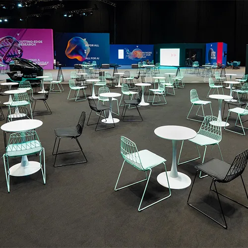 Modern event seating arranged to encourage conversation and guest interaction.