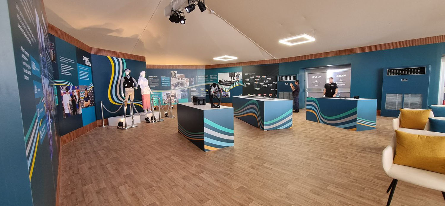 Branded event furniture combining visual identity with practical functionality.