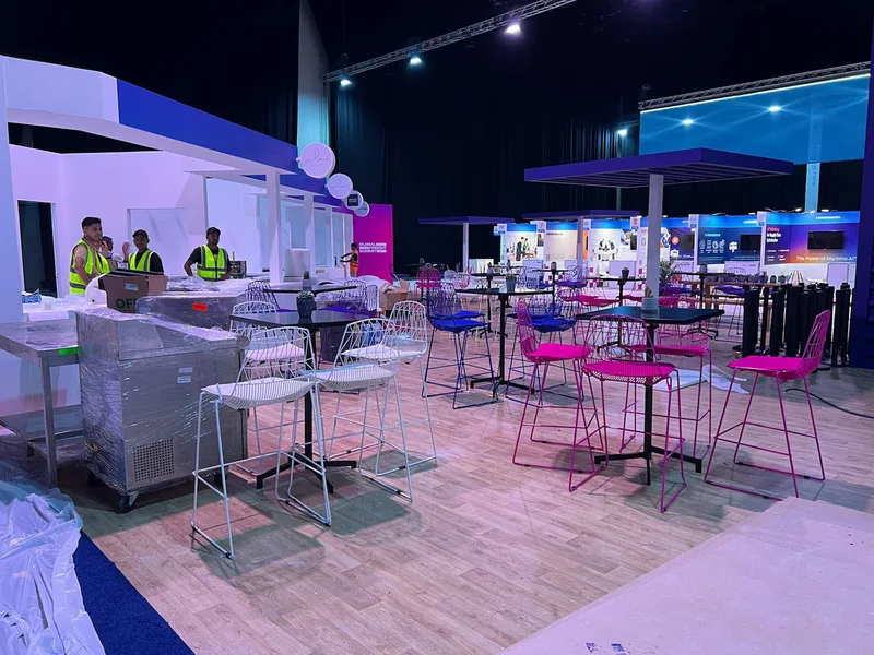 Hospitality seating and coffee tables creating professional networking spaces at Global Freight Summit 2024.