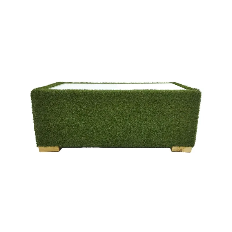 F-CT121-GS Eden coffee table finished in artificial grass with dark wooden feet and glass top