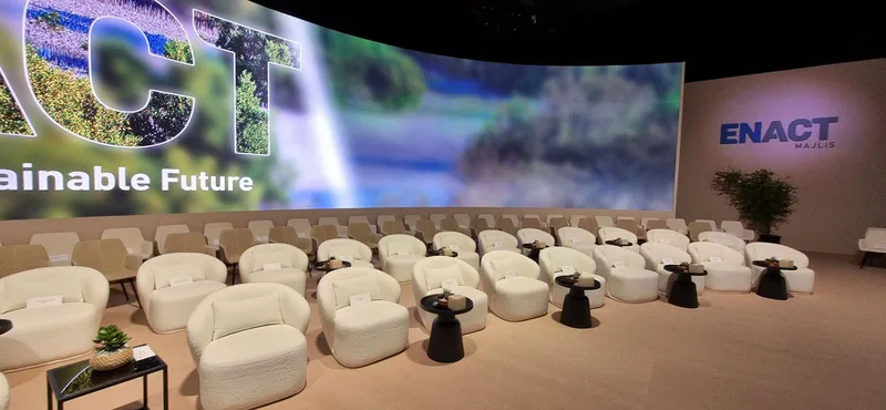 Premium sofas and tables forming sophisticated networking environments.