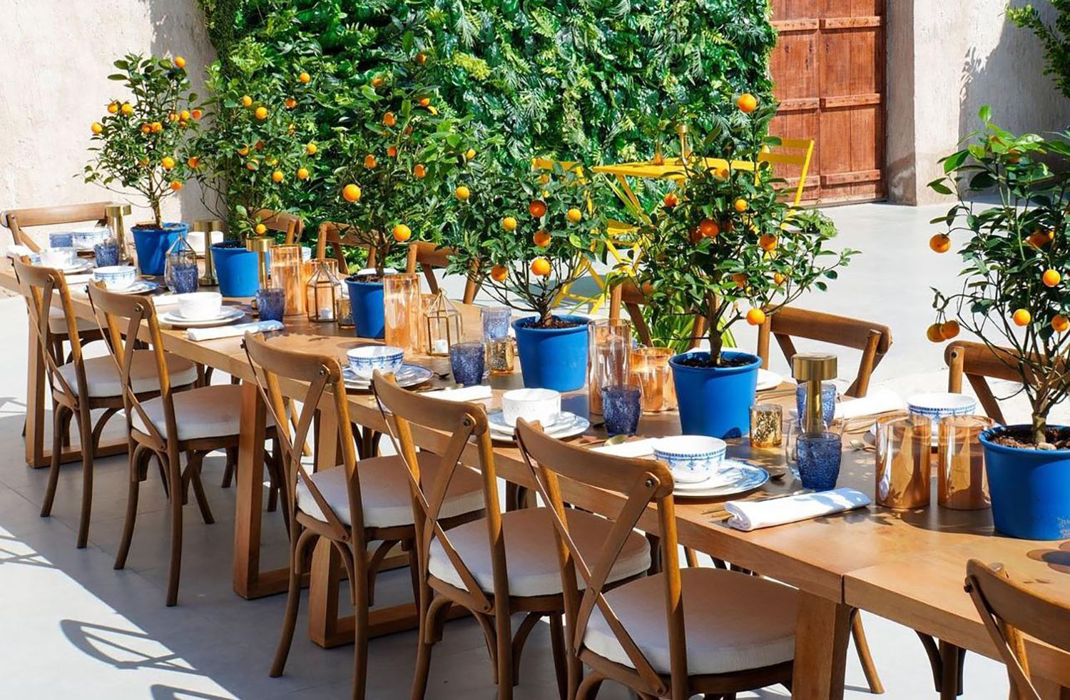 Outdoor dining environment showcasing premium hospitality furniture for Sikka Art Festival 2024.