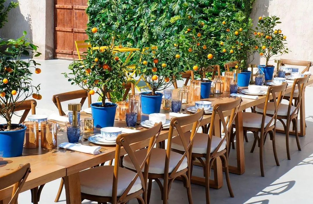 Outdoor dining environment showcasing premium hospitality furniture for Sikka Art Festival 2024.