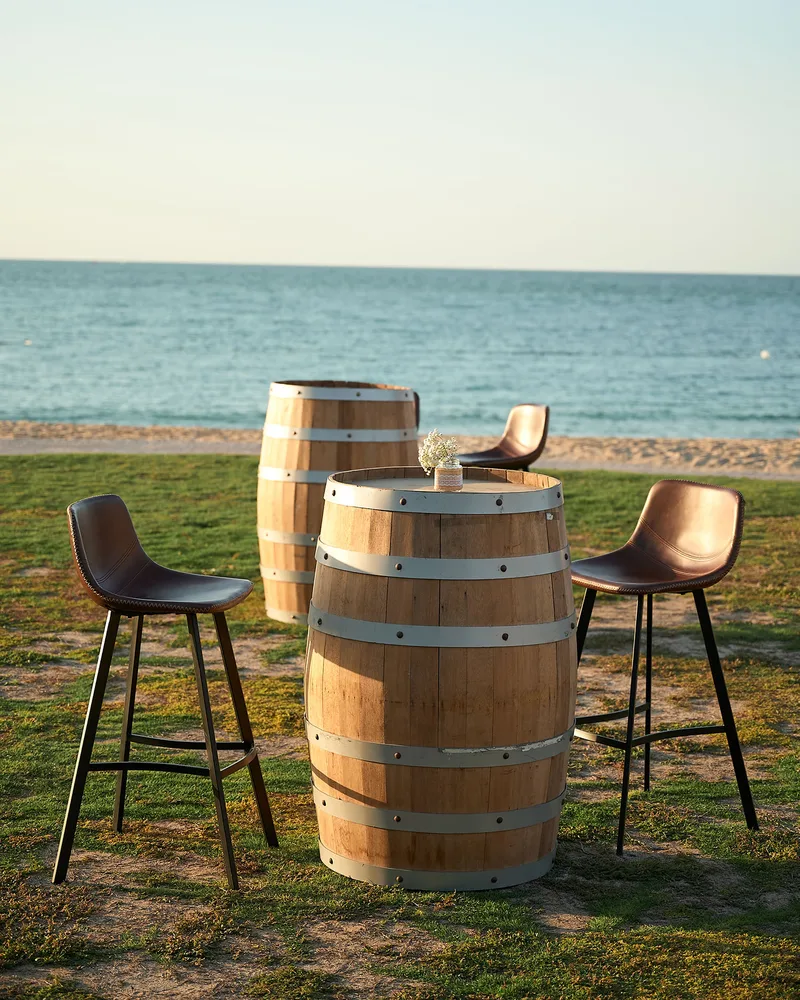 Lounge furniture arranged to encourage relaxed guest interaction throughout the hospitality venue.