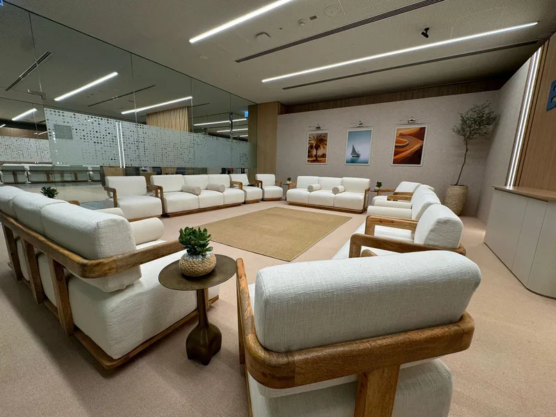 Premium executive seating arrangement supporting the ADNOC Investor Forum hospitality environment.