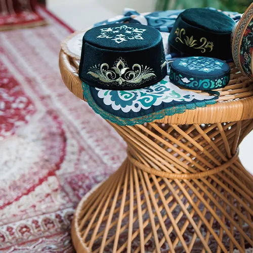 Peacock side table styled within a culturally inspired private event lounge