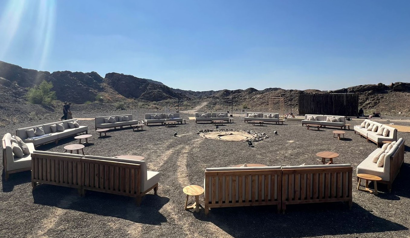 Desert-inspired hospitality furniture creating relaxed visitor environments at Wadi Modaynah Dam.