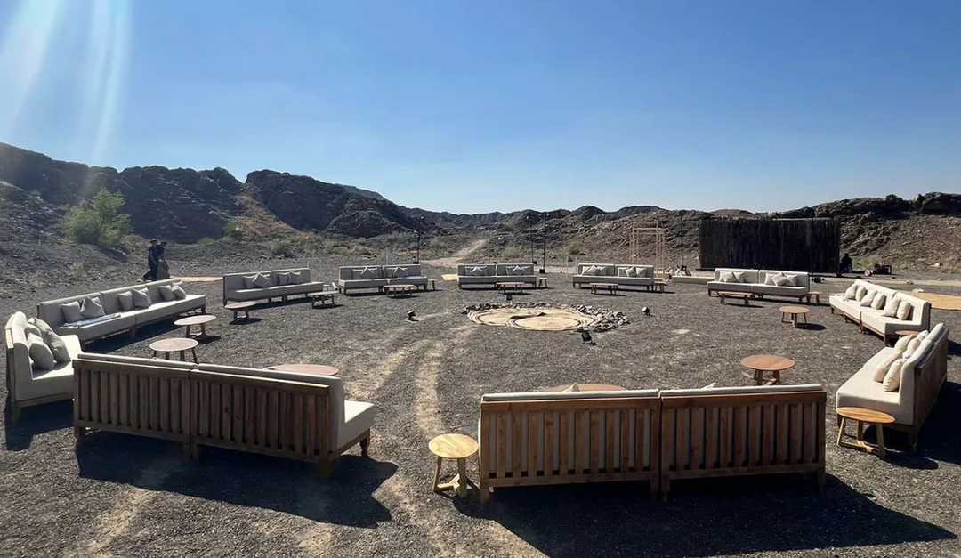 Desert-inspired hospitality furniture creating relaxed visitor environments at Wadi Modaynah Dam.