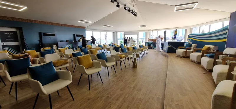 Stylish lounge furniture arranged within temporary VIP hospitality areas in Abu Dhabi.