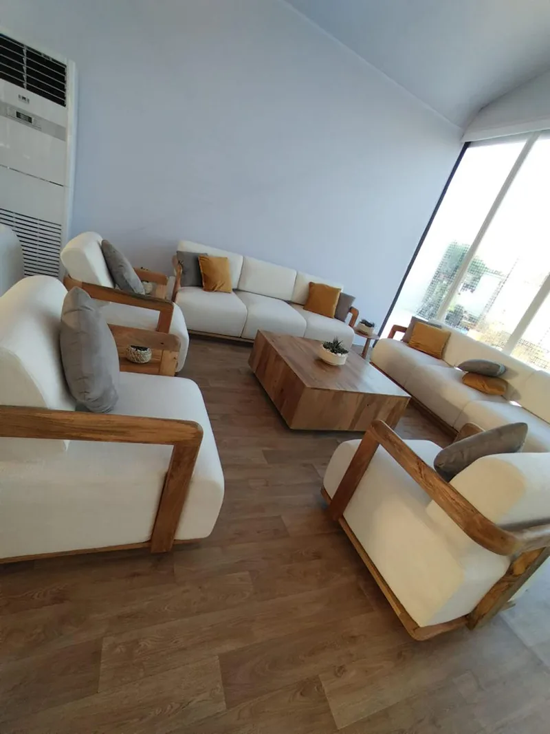 Premium furniture collections creating welcoming majlis-style hospitality environments.