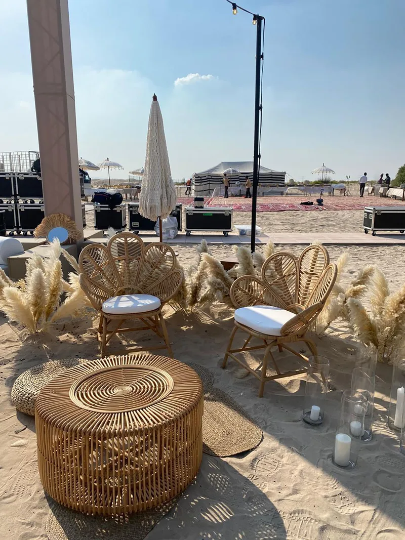 Elegant outdoor lounge seating creating a luxury hospitality environment within the Al Wathba Desert venue.
