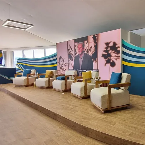 Contemporary lounge seating and occasional tables supplied by Evolution Furniture.