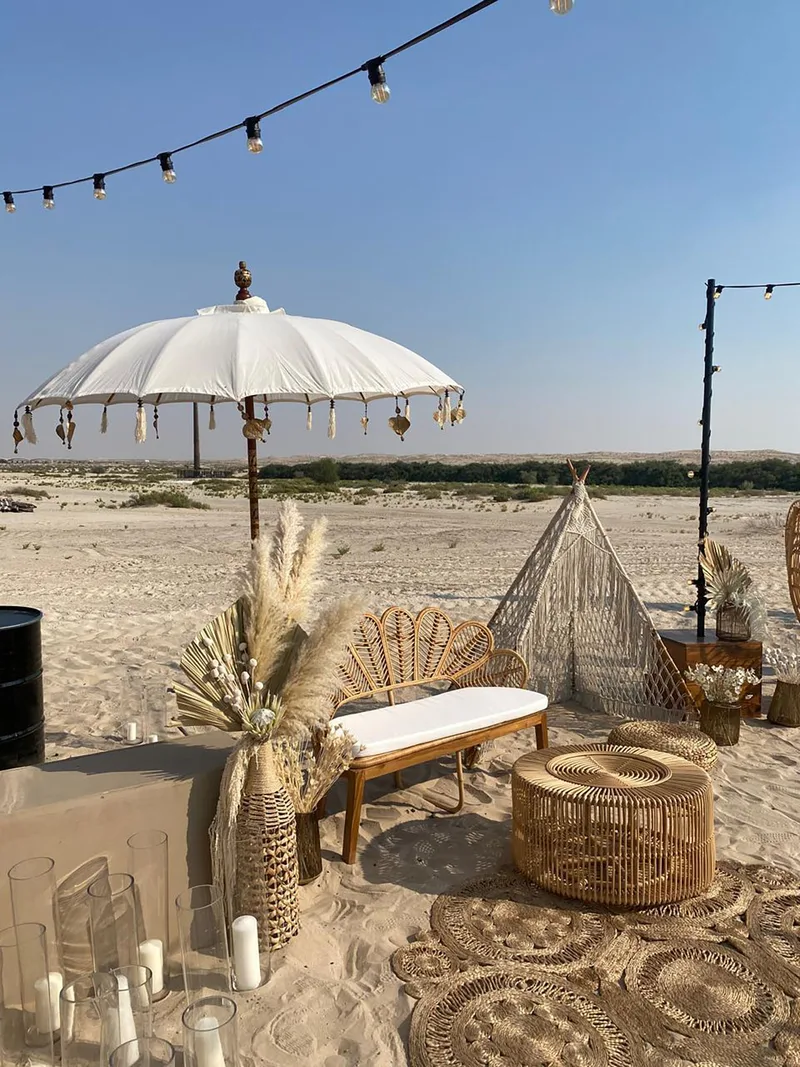 Contemporary outdoor furniture transforming a temporary venue into an elegant private event setting.