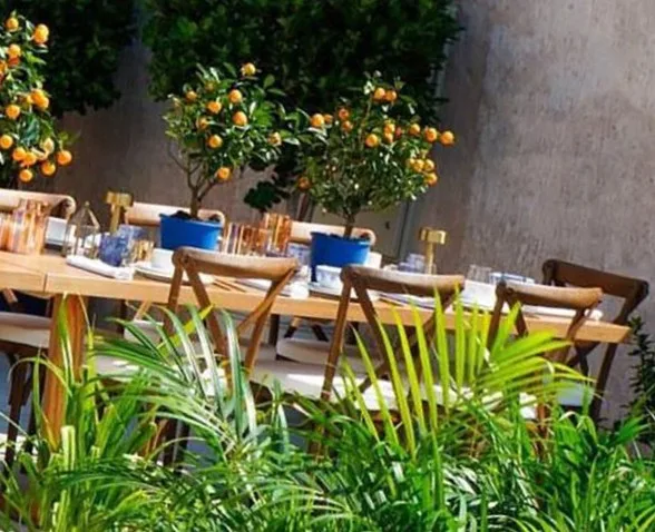 Carefully planned dining furniture layout supporting guest comfort within Al Bastakiya's historic surroundings.