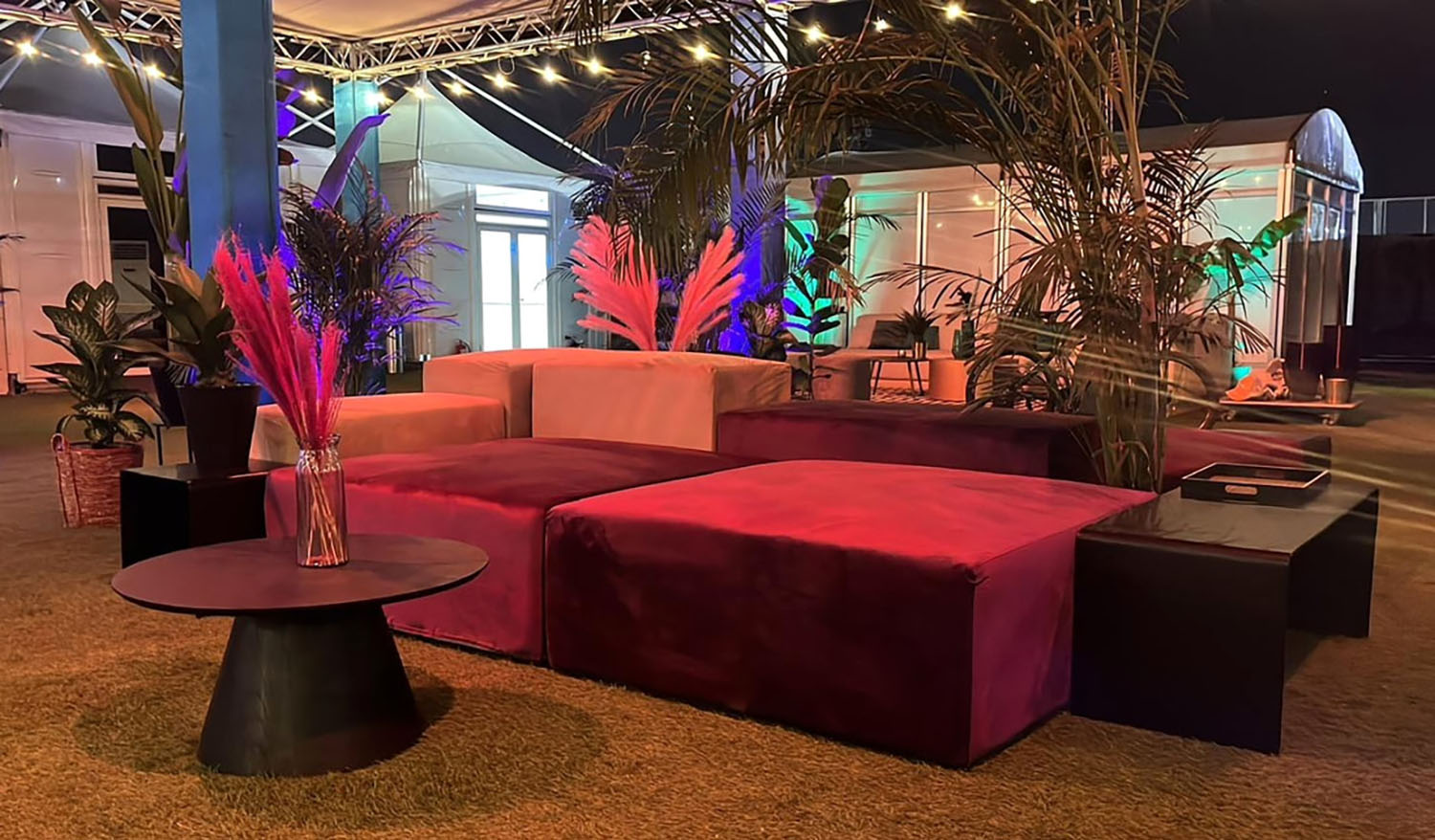 Evolution Furniture white lounge sofas with timber frames and sculptural coffee tables in Riyadh