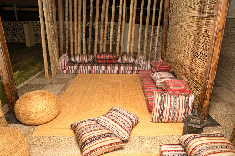 Traditional Arabic seating area creating an authentic hospitality environment.