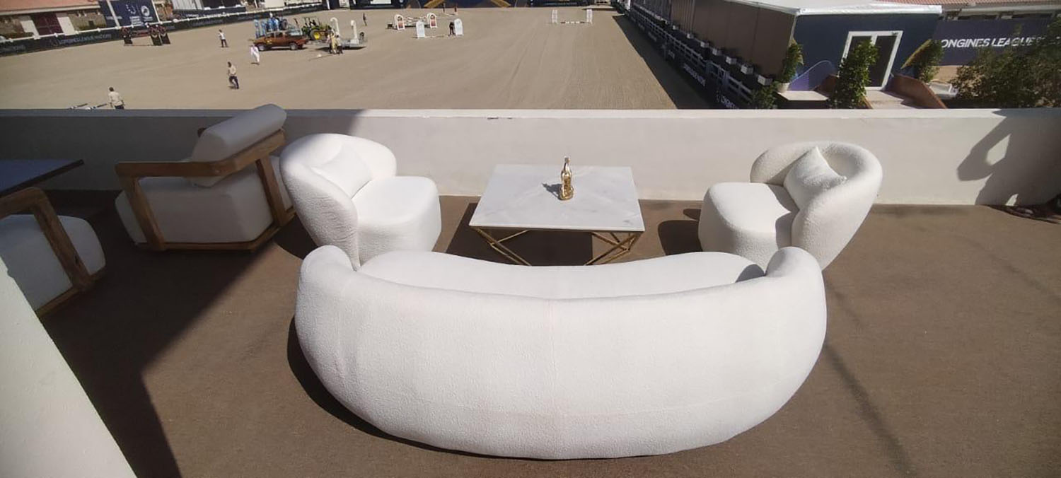 Luxury outdoor sofas and armchairs furnished for premium hospitality terraces.