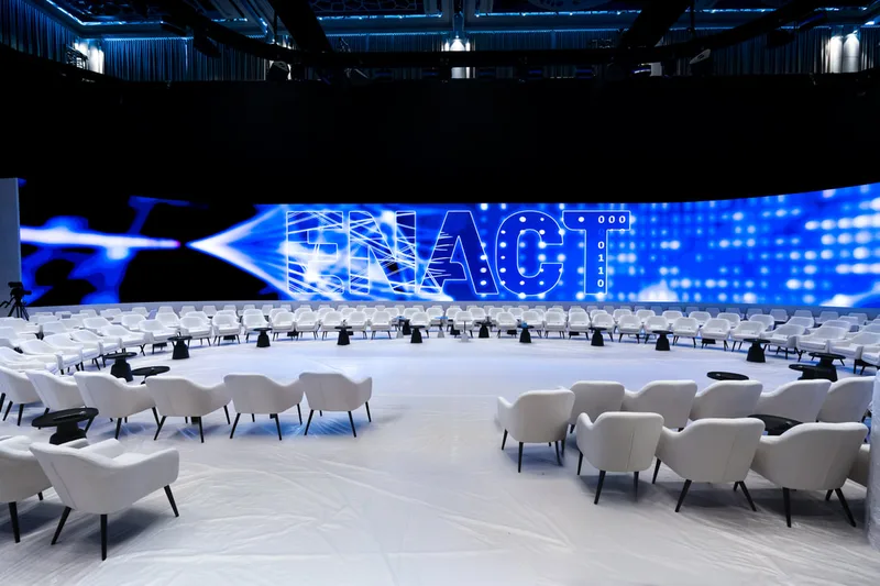 ENACT Majlis Conference design - an unusual in the round conference set up designed and delivered by Evolution